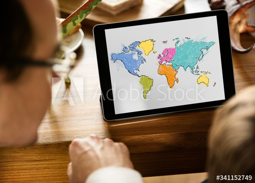 Family dad and son using tablet for e-learning cartography mapping