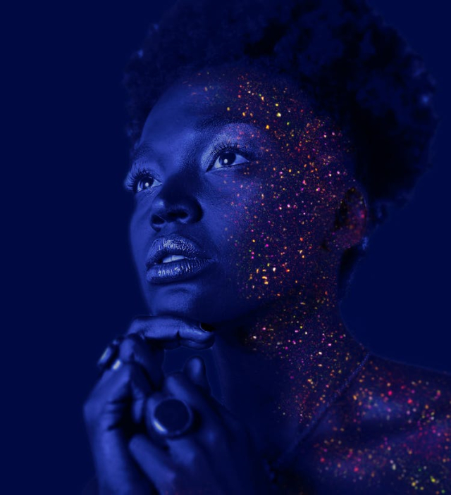 Fashion Photography of Woman Hands on Chin With Glitter Makeup