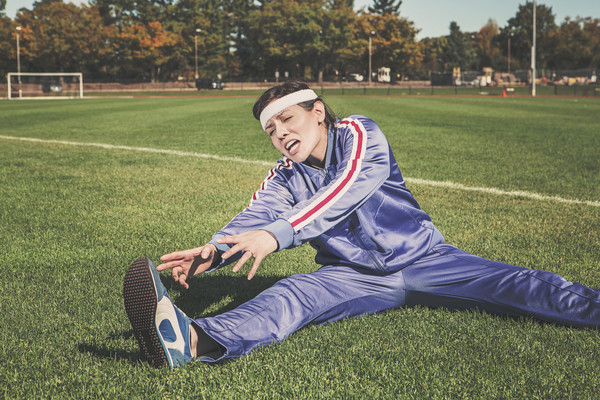 Free Photo of stretching, tracksuit, track and field