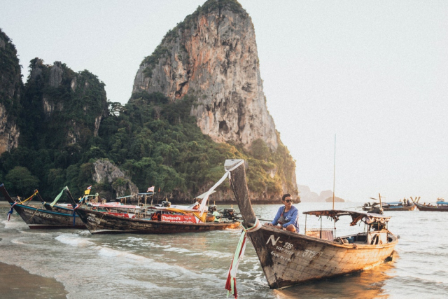 Man Riding Boat