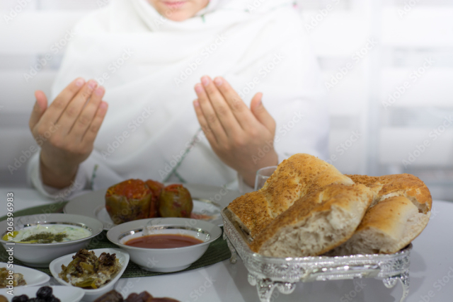 ramadan food and praying woman