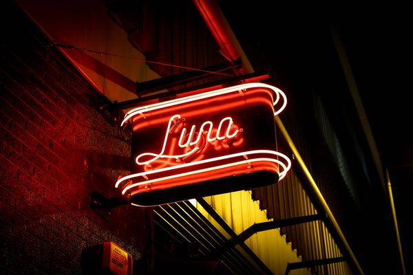 red Luna neon light signage during night time