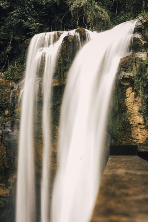 Serene Waterfall Cascading Down Rocks