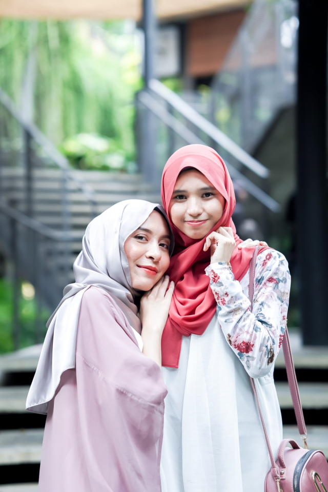 Smiling Women Wearing Hijabs