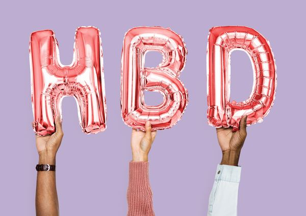 three HBD foil balloons