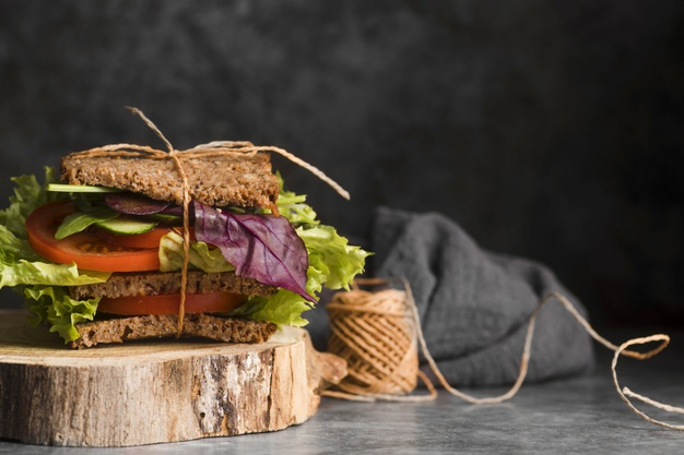Toast sandwich on wooden board Free Photo