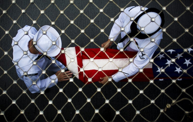 U.S. Sailors fold the American | Free Photo - rawpixel