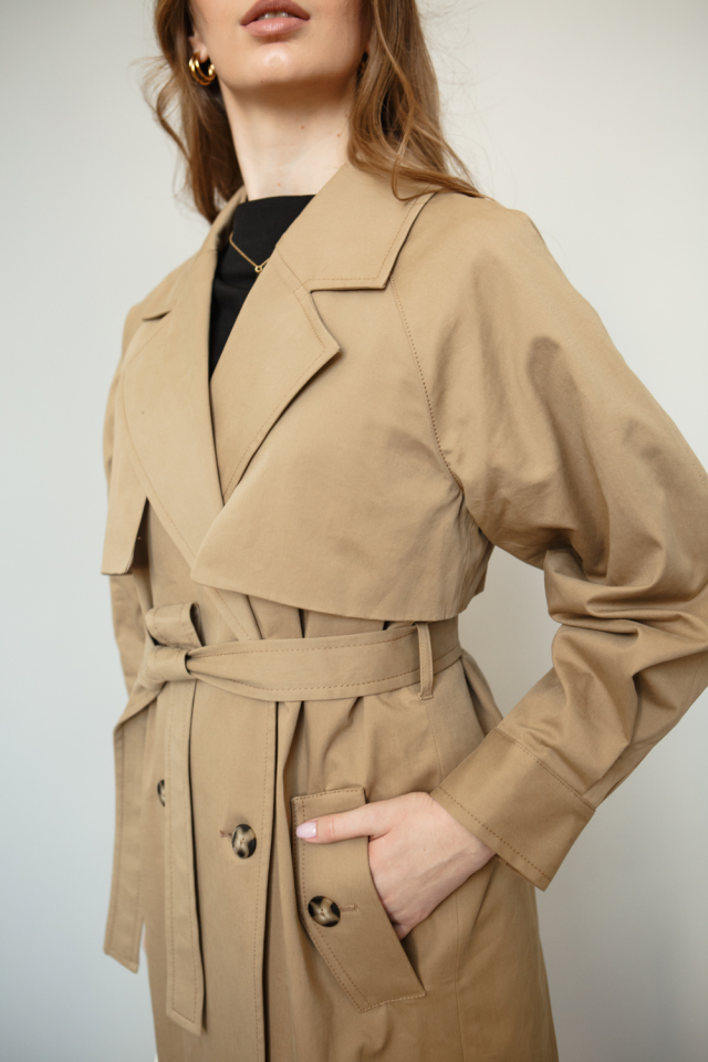 Woman wearing a trench-coat