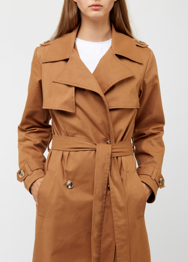 Woman wearing a trench-coat