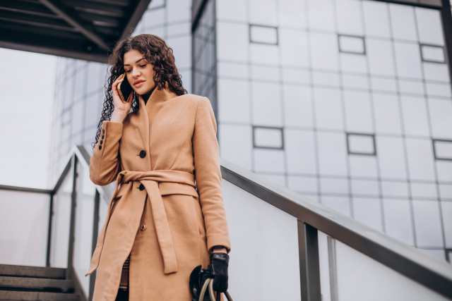 Woman wearing a trench-coat