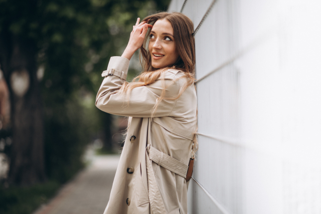 Woman wearing a trench-coat