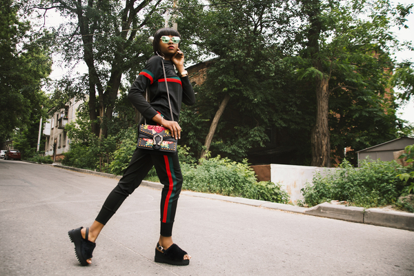 Woman Wearing Black-red-and-green Tracksuit